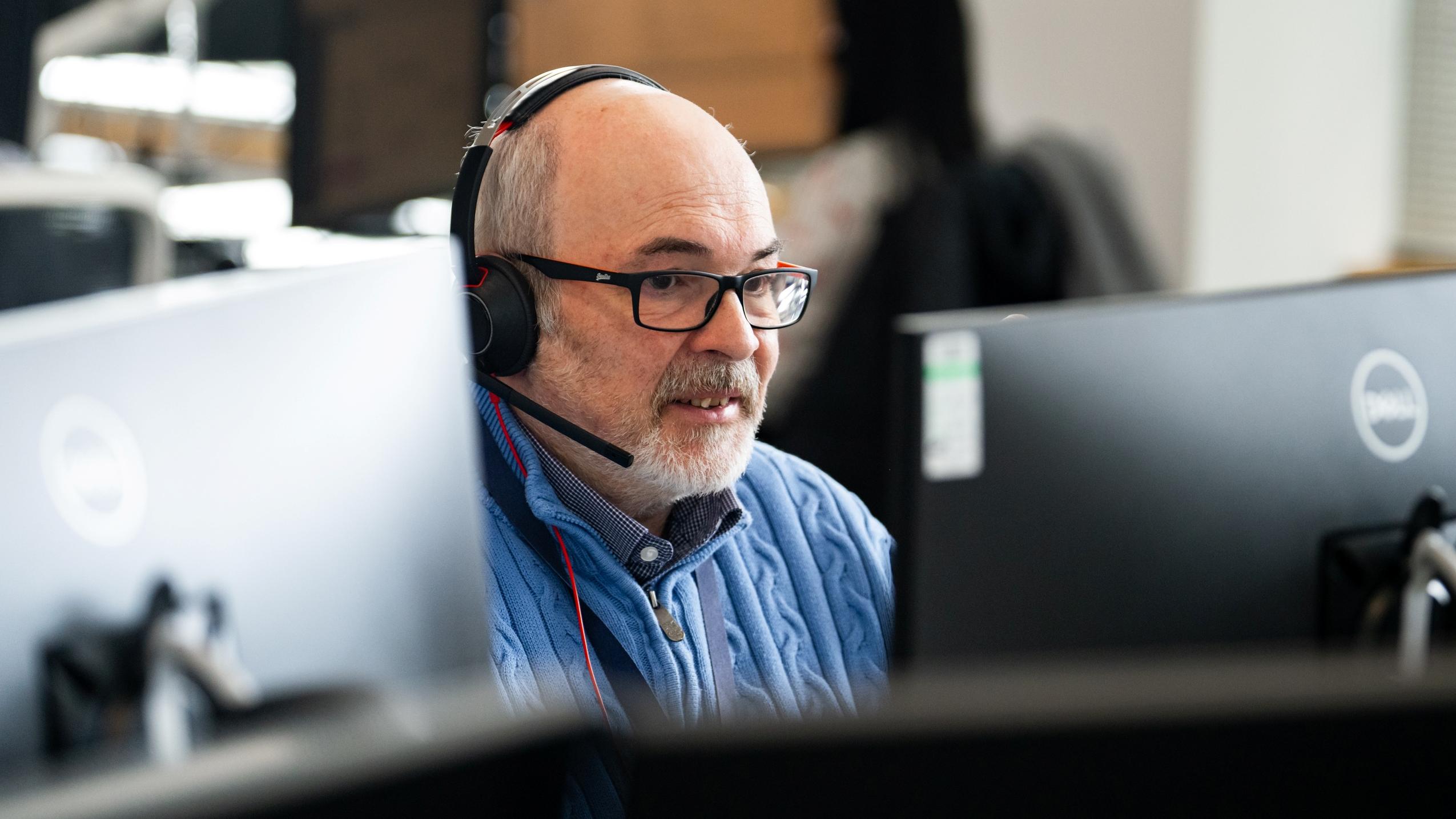 Male Business Stream colleague in Customer Service Centre