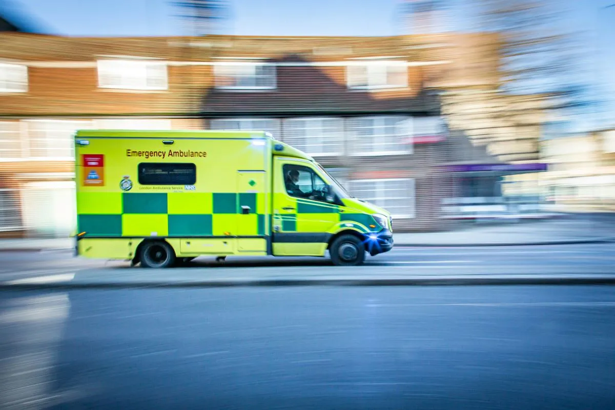 Yellow Emergency ambulance rushing