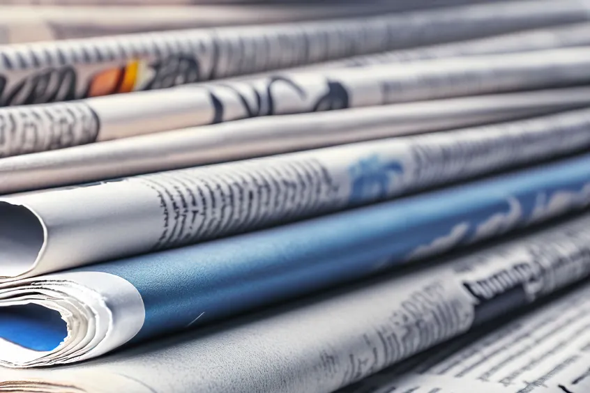 Stack of folded newspapers