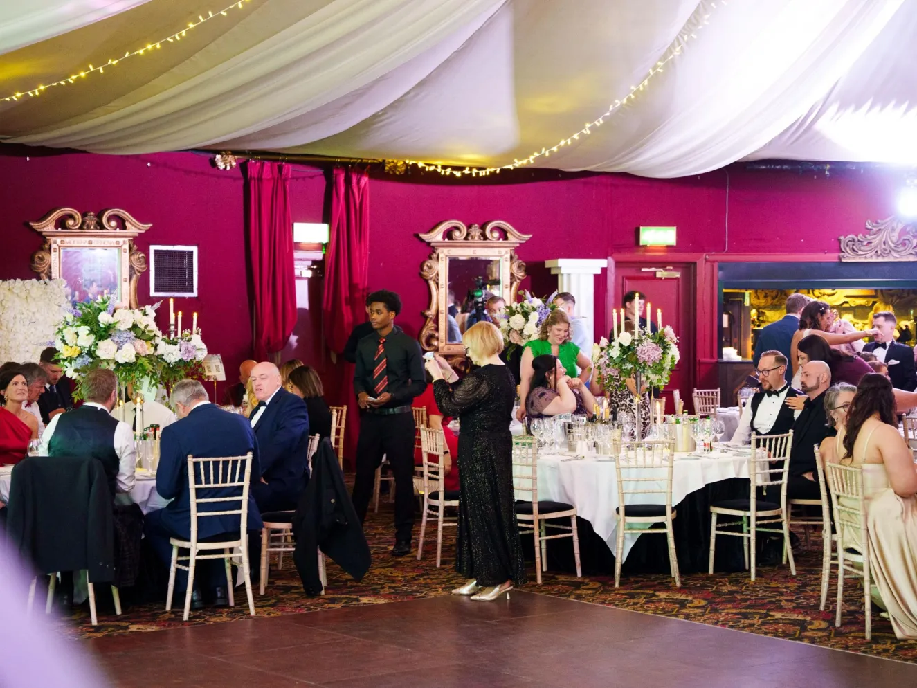 Business Stream colleagues celebrating in festive dinner surroundings at Awards Night